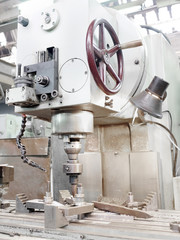 image of a drill press