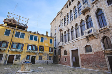 Fototapeta na wymiar Venice, Italy, June, 21, 2016: facade of an ancient house in Venice, Italy