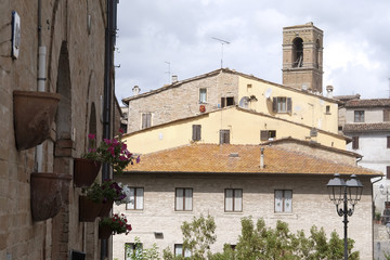 Fototapeta premium Urbania, Italy - August, 1, 2016: inhabited houses in Urbania, Italy