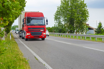 Fototapeta na wymiar Rovigo, Italy - June, 28, 2016: truck on a highway in Rovigo, Italy