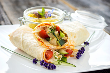 Delicious homemade tapas tortilla with couscous and nuts on a wooden background