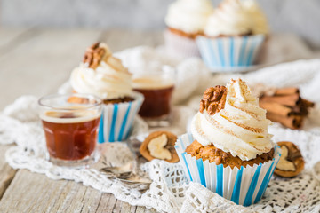 Carrot cake cupcakes with butter cream frosting