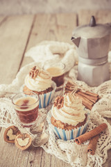 Fototapeta na wymiar Carrot cake cupcakes with butter cream frosting
