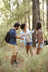 Fototapeta premium Three worried friends in a forest