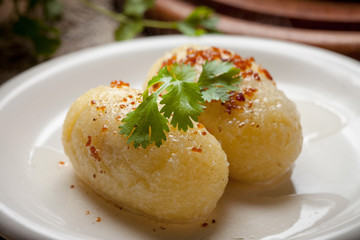Potato dumplings stuffed with minced meat.