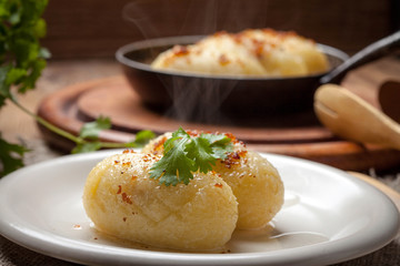 Potato dumplings stuffed with minced meat.
