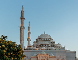 Fototapeta na wymiar Mosque at sunrise in Sharjah, United Arab Emirates