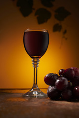 bunch of grapes and wine on the table