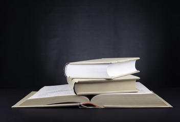 Stack of books on a black background