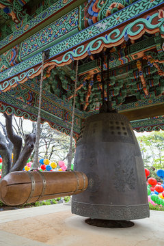 Close-up of a wooden beam and a Bonshō (a Buddhist bell, hanging bell or great bell) at Bell Pavilion at Gilsangsa Temple in Seoul, South Korea.