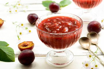 plum jam homemade on white background