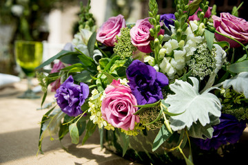 Floral table centerpiece at a wedding reception