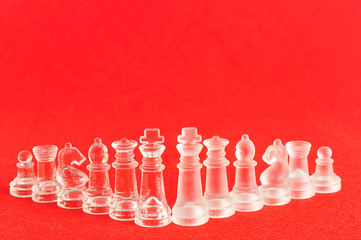 Different chess pieces displayed on a red background