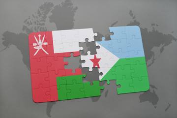 puzzle with the national flag of oman and djibouti on a world map background.