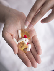 Heap of pills on hand
