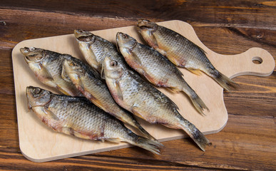 Dried fish on a wooden table