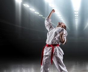Sexy girl in a kimono karate rejoices victory © bondarchik