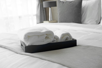 white towels on bed