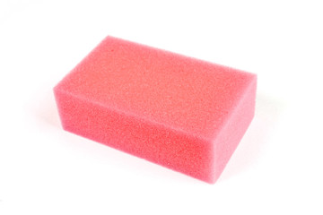 Red sponge isolated on a white background.
