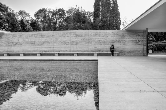 Person On Bench At German Pavilion In Spain