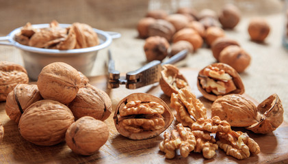 Walnuts and a nutcracker on a table
