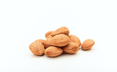 Almonds in shell on white background