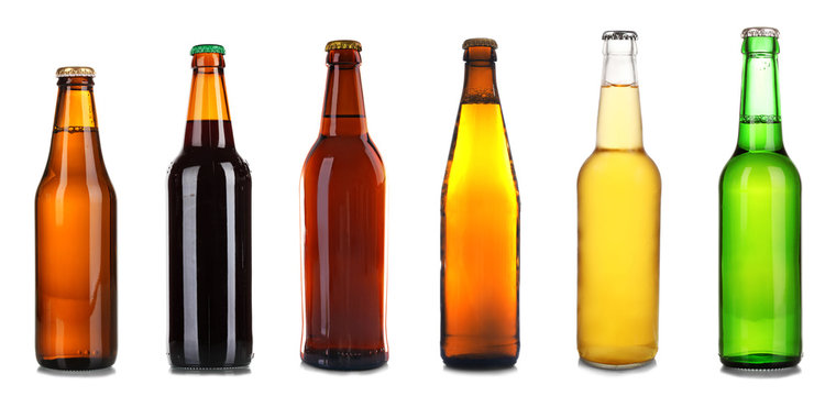 Bottles of different beer isolated on white