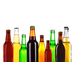 Bottles of different beer isolated on white