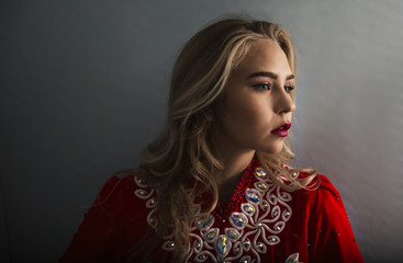 Close-up of an Irish dancer wearing a red and white competition costume