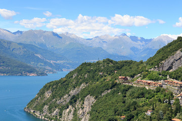 Fototapeta na wymiar Mountain panorama at Lake Como and village Varenna in Lombardy, Italy