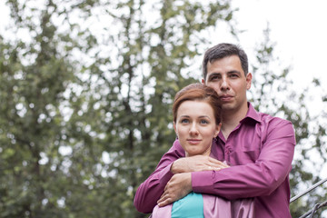 Fototapeta premium Beautiful couple outdoors in a summer day