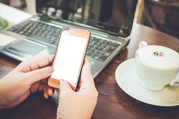 woman using smartphone white screen in coffee shop
