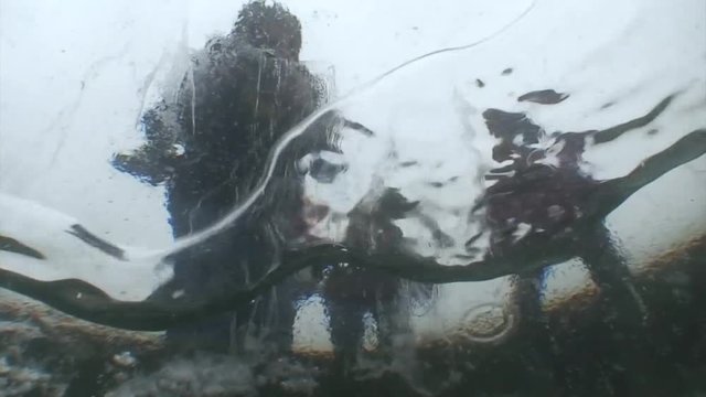 ice diving scuba diving course on diving school with diving instructor snowing outside