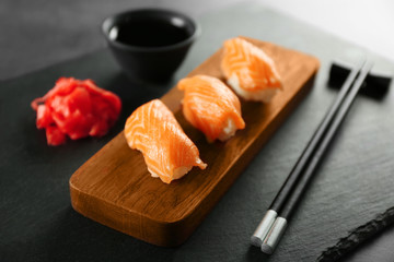 Sushi set and chopsticks on slate plate