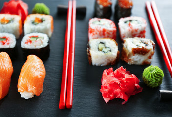 Sushi set and chopsticks on slate plate
