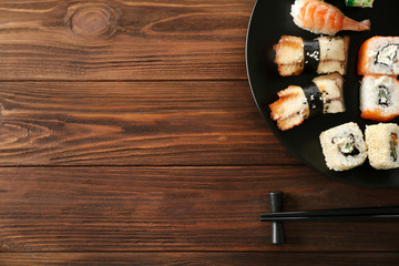 Delicious sushi set on ceramic plate