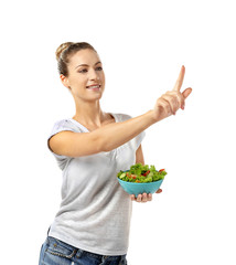 Beautiful girl with salad pointing finger, isolated on white