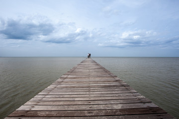 Fototapeta premium Wooden walkway into the sea