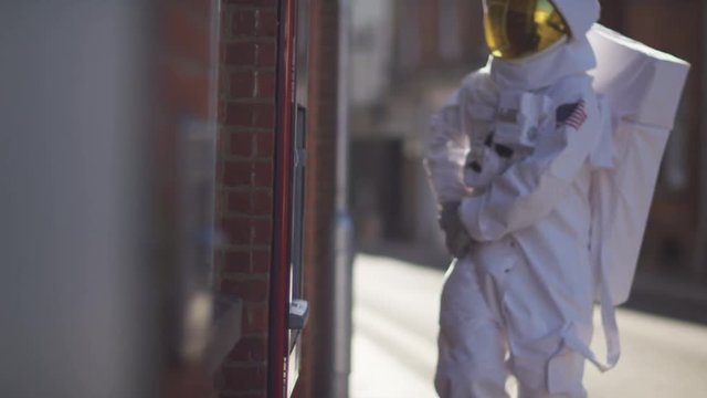  Frustrated astronaut fails to get money from an ATM machine