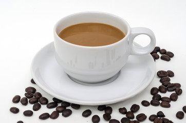 coffee in white cup with coffee beans