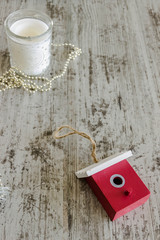 Christmas toys, decor, house, candle. Empty copy space for inscription Idea of merry new year