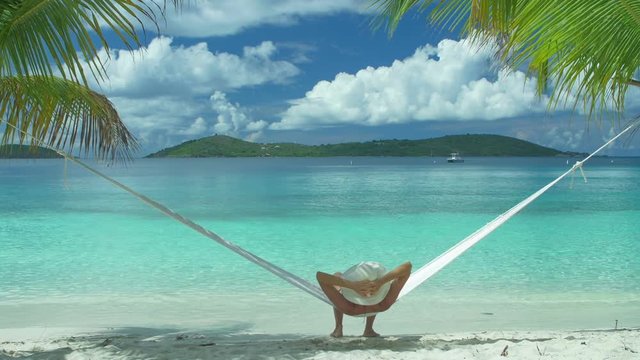 Video of a woman relaxing in a hammock on St John, United States Virgin Islands