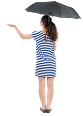young woman in  dress under an umbrella. Rear view people collection.  backside view of person.  Isolated over white background. Swarthy girl in a checkered dress checks whether the rain ended.