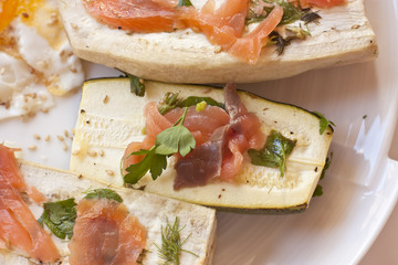 Photo of eggplants and zucchinis cooked with marinated salmon
