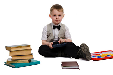 elegant little schoolboy studying