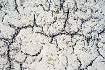 Grey stone wall in decay