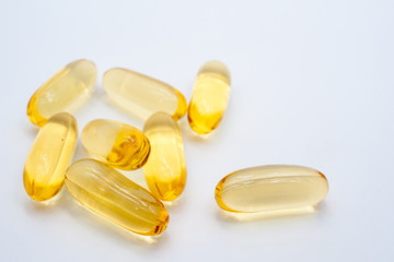 Omega 3 capsules from Fish Oil on white background.