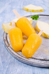 Homemade ice lolly of melon