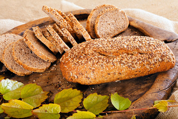 decoration of bread with leaves on a wooden  plank
