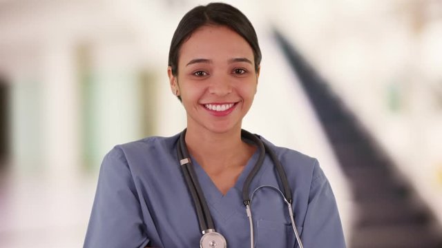 Happy Mexican woman nurse smiling